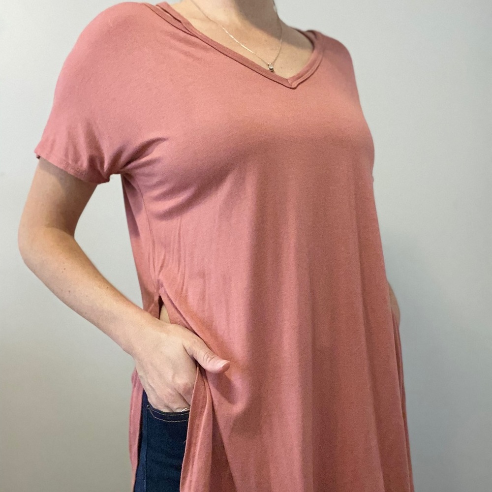 Rose colored, cut out, slitted, tee shirt.
